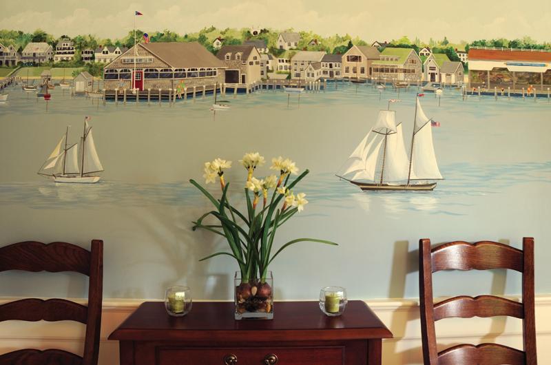 The mural that wraps around the dining room depicts Edgartown harbor with the Edgartown Yacht Club, the town wharf, sailboats, and more.