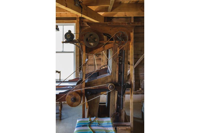 An antique sorting machine separates the berries from the chaff.