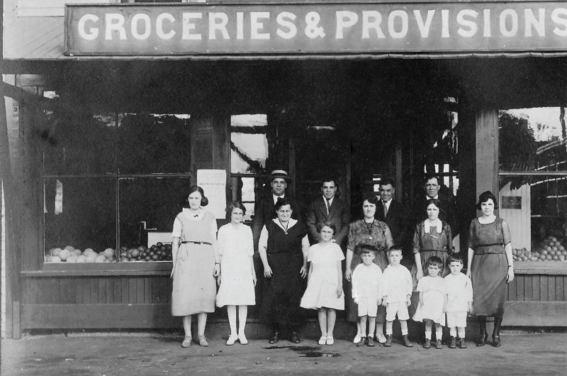 The Cronig brothers and their families in the 1920s at their market in Oak Bluffs (now Our Market).