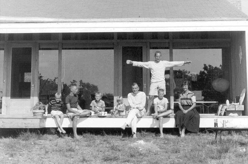Eliot Noyes, standing, and Molly Noyes, seated at right, with various friends and family on the Vineyard in 1955 or 1956. Their son Frederick Noyes, who has helped to update some of his father’s Vineyard homes, is seated between his mother and Robert Osborn, a well-known cartoonist.