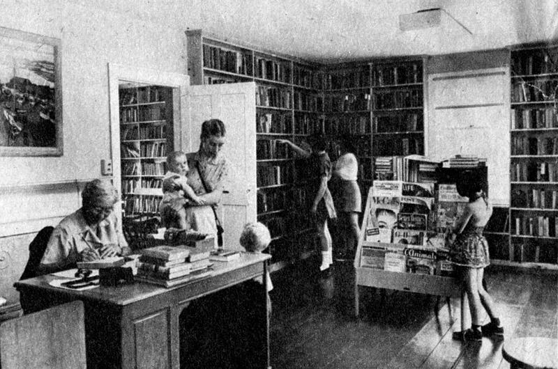 Presiding librarian Lucy Vincent (seated) during the grand opening of the Chilmark Library’s move to its new (and current) location, 1956.