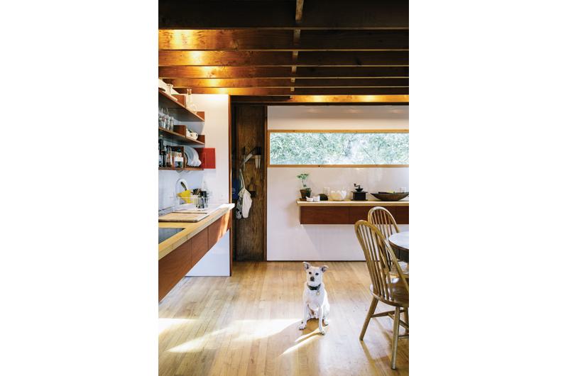 The Brody house kitchen is located in a secluded alcove off the central portion of the home.