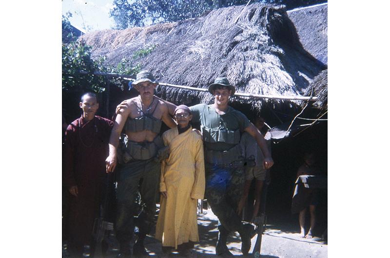 Fischer (second from left) still has occasional nightmares about the war.