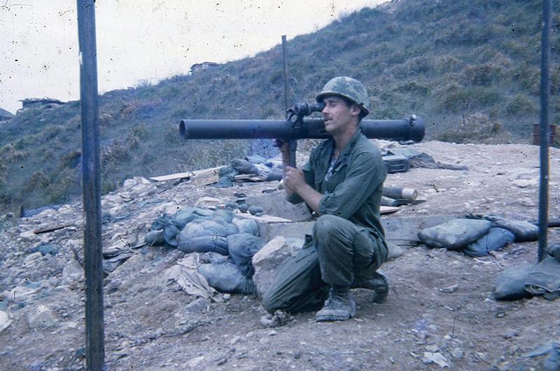 Fischer practicing in Vietnam in 1969 with an M67 recoilless rifle, an effective weapon against machine gun bunkers.