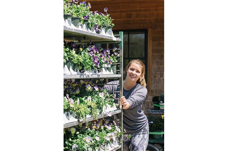 Sarah Vinone Page pushes the pansies at Jardin Mahoney.