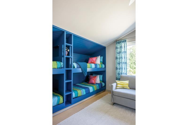 A bunk room, evocative of old Vineyard camps, is given a bright, modern upgrade.