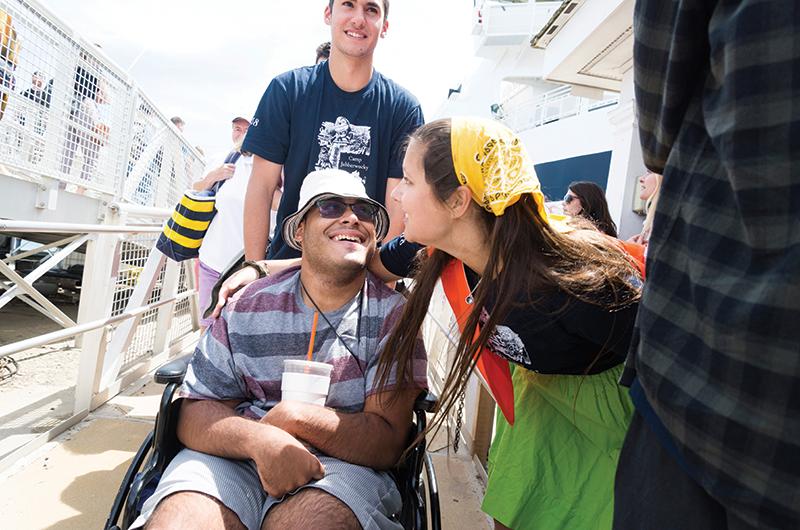 Counselors greet campers at the ferry for the start of another season at Camp Jabberwocky, winner of Best Summer Camp.
