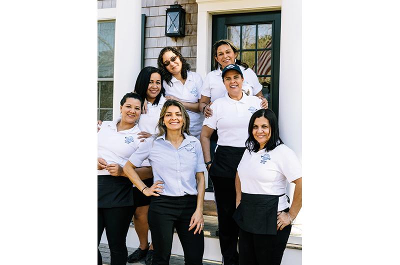 Genainna Pereira (center) of Shine Bright Martha’s Vineyard Cleaning Services scrubbed the competition to win Best Cleaning Company.
