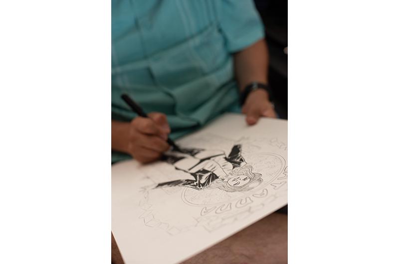 Creating a single page of the graphic novel is a process that can take up to eighteen hours.