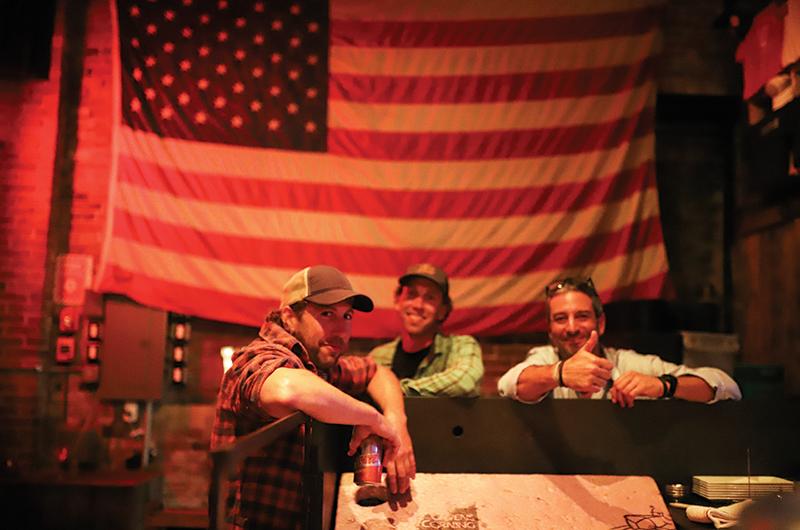 Ted and Patrick Courtney with Port Hunter manager Brice Contessa, who oversees the Port Hunter’s live music scene.