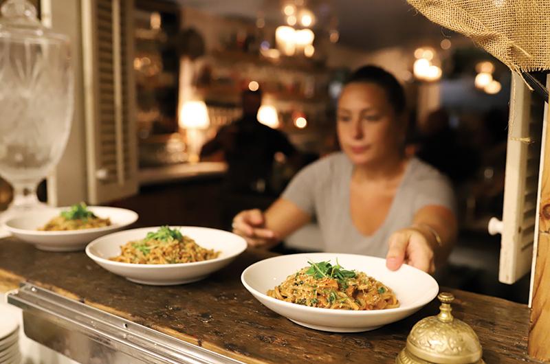 The brothers opened The Covington as an alternative to the livelier Port Hunter. The newer restaurant features an upscale menu and quieter scene.