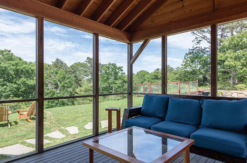 Why buy it when you can build it? Gately crafted the couch and side tables for the screened-in porch and the Adirondack chairs for the backyard.