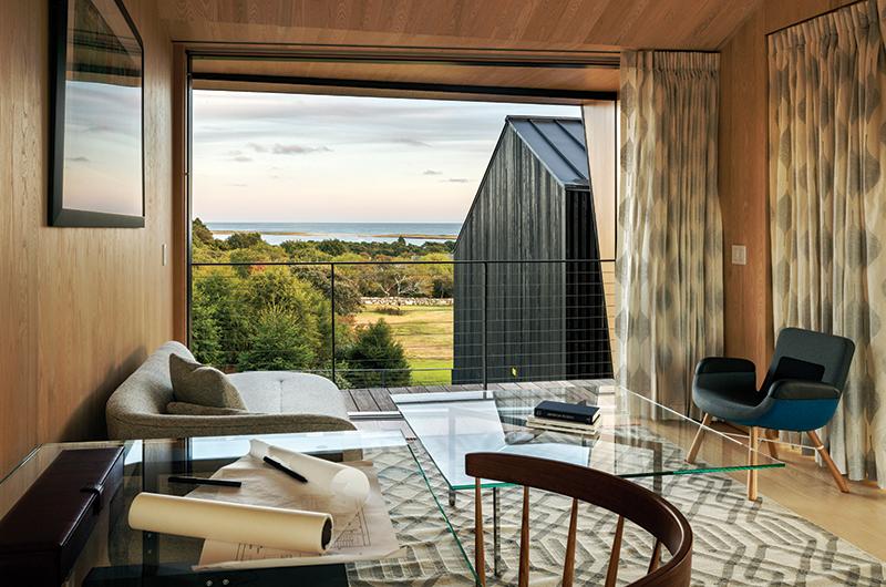 Most spaces, including this office above the garage, are designed to be shared by the various family members.