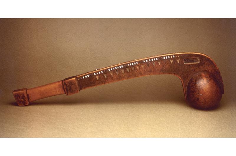 Ball-club, known as “Metacomet’s War Club,” Wampanoag, Rhode Island, c. 1670, maple, quahaug shell, whelk shell, horn. Reputed to have belonged to Ousamequin’s son “King Phillip.”