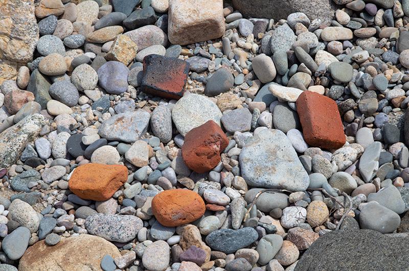 Thousands of defective bricks were thrown out every year, resulting in many of the weathered bricks found on Vineyard beaches today.