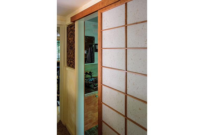 Traditional Japanese shoji are used to separate living spaces.