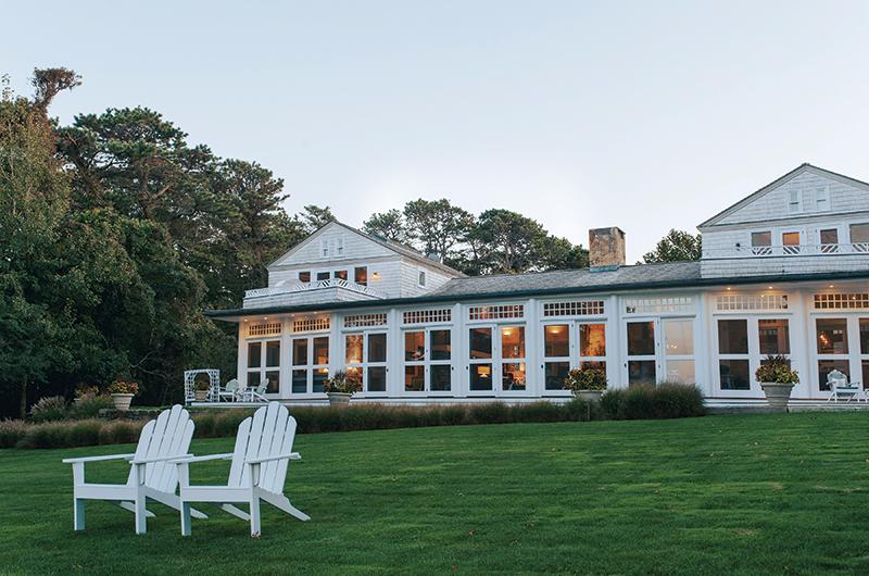 The rear of the house is filled with windows for uninterrupted water views