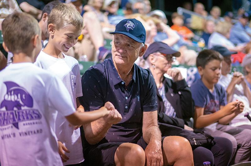 Co-investor Bill Murray meets fans in the grandstand.