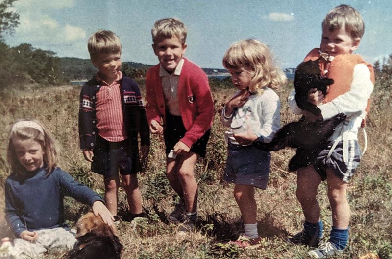 Three of their children, Sarah (far left) and Heather and James Norton (far right) at the farmhouse field with friends Paul and Andrew Baird in 1968.