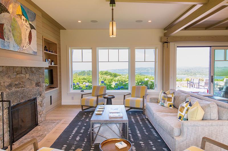 Interior designer Irma Reshefsky’s clean lines and oceanic tones complement the scenery.