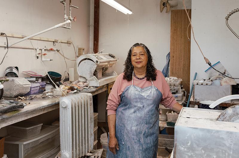 Berta Welch cuts, grinds, and shapes the shells in a workshop attached to her Aquinnah home.