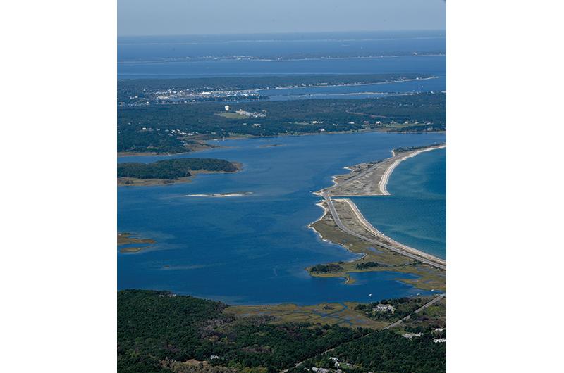 View of the Oak Bluffs side of Sengekontacket Pond, where in the 1970s the MVC blocked the creation of a major suburban-style subdivision.