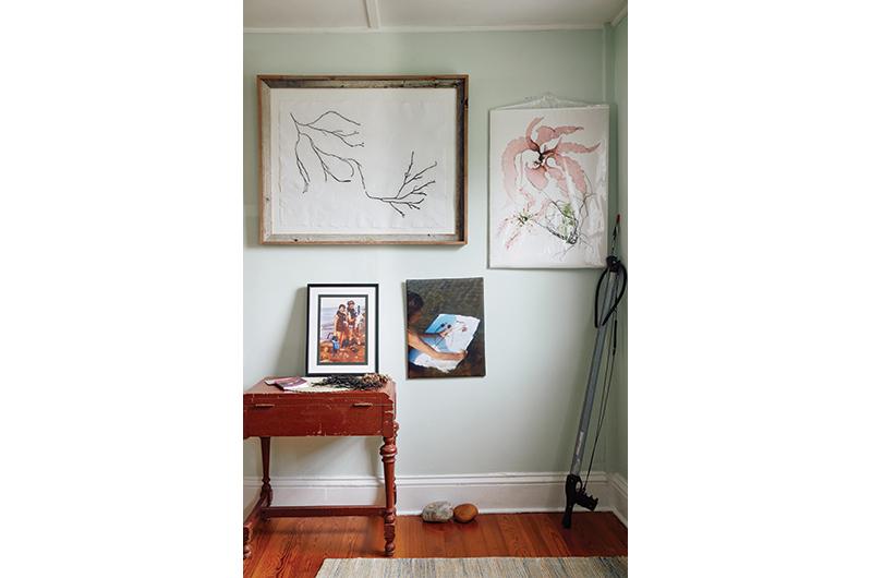 The art, photos, and treasures that decorate her home are a testament to her love of the ocean.