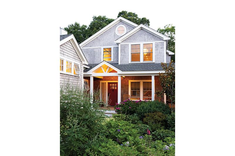Lush plantings by Garden Angels cocoon the home.