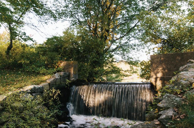 A stretch of the Tiasquam River runs through the property and includes a dam, two spillways, and a pond.